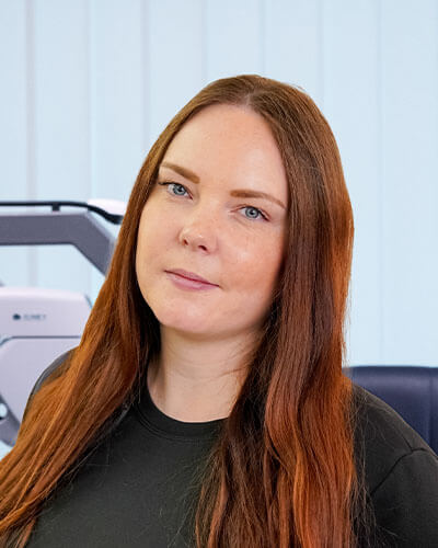 Porträtfoto einer Mitarbeiterin des Augenzentrums